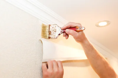 Pose de papier peint à Sassay — revêtements muraux et toiles de verre